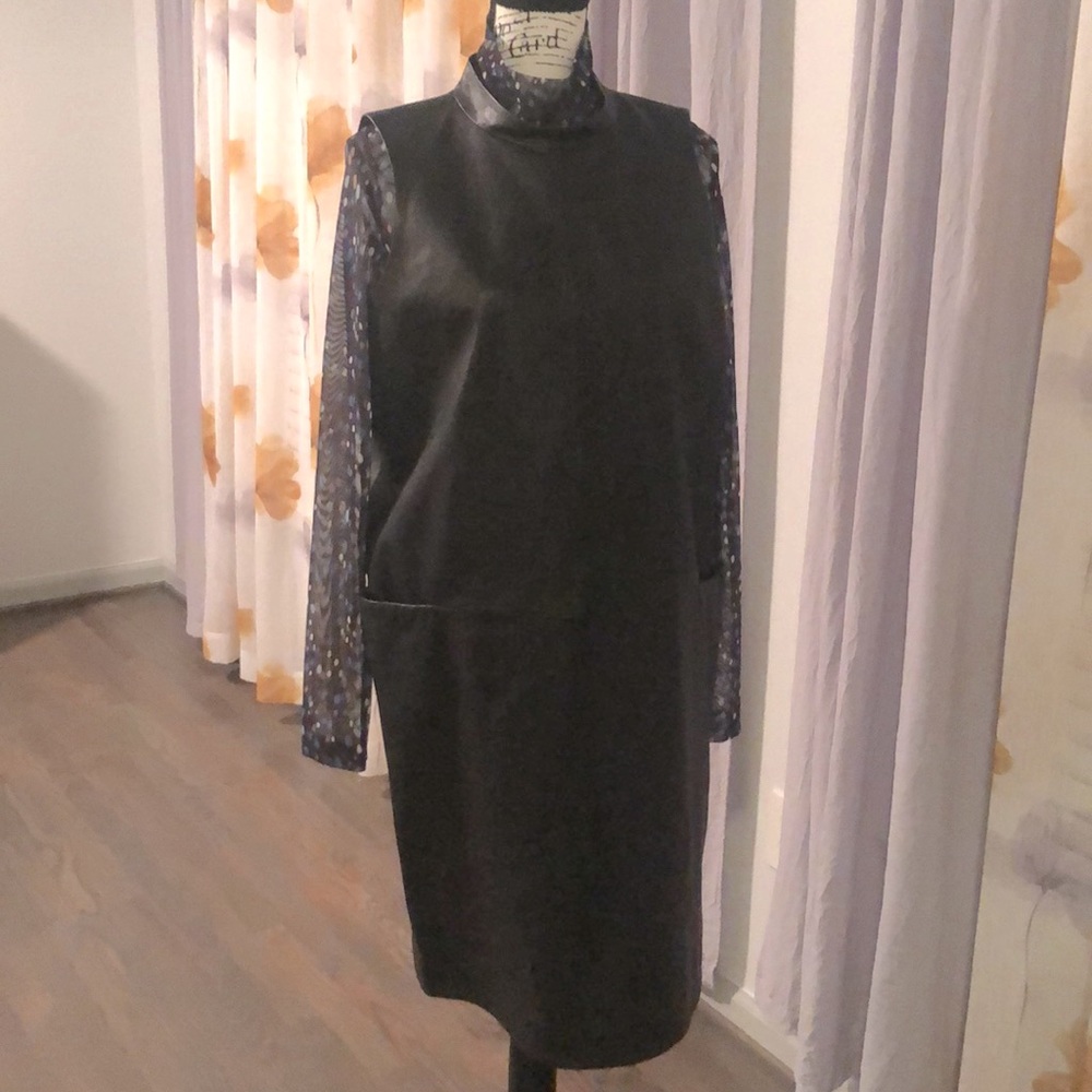 Black,sleeveless,Vegan,new(no tag)leathers new dress.Turtleneck not included
